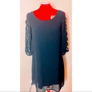 Black slip dress with cutouts